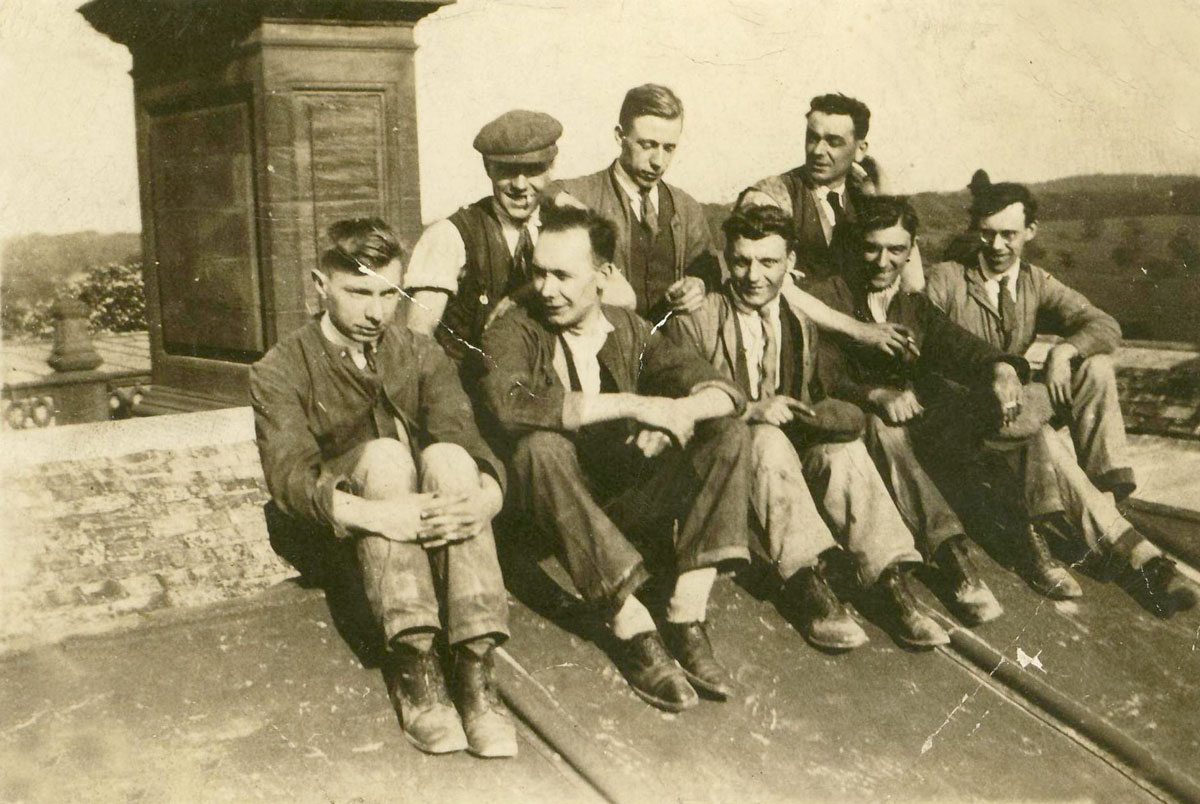 Men on roof of Harewood House. Centre front is Joe Pattison. Joe was from Newcastle and worked for a Newcastle firm on the electrics in the house in 1929. The workers lived in huts in the park whilst the work was done.
